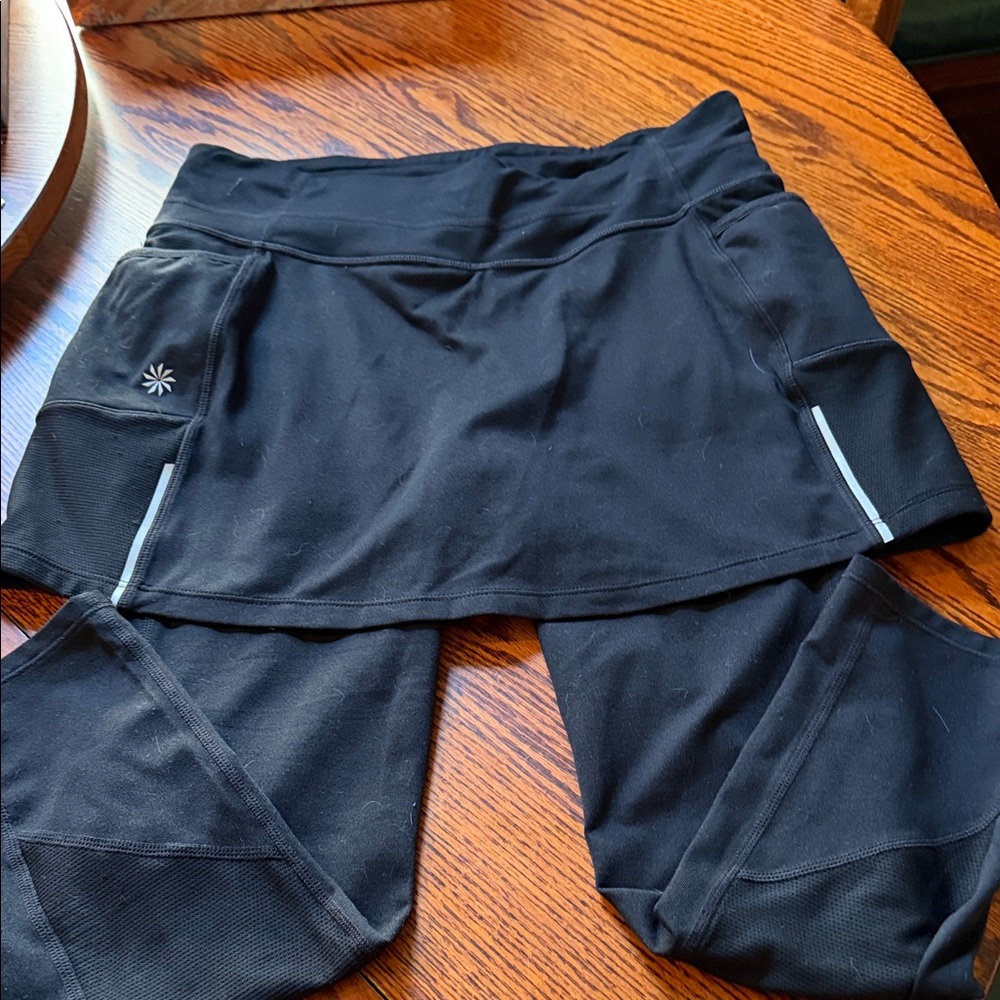 Athleta Women's Black leggings with skirt/Reflective Details